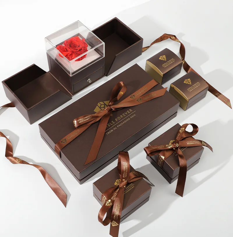 Assorted custom jewelry packaging boxes and ribbon